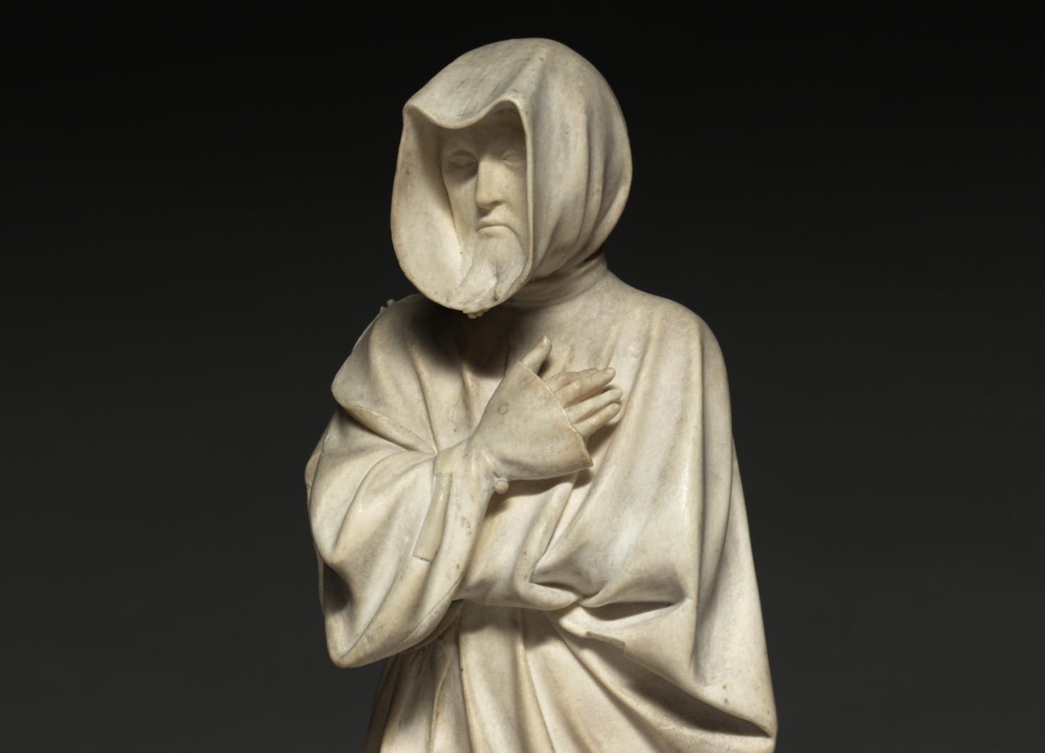 Statue of Mourner from the Tomb of Philip the Bold, Duke of Burgundy (1364-1404) by Claus de Werve - Catholic Stock Photo