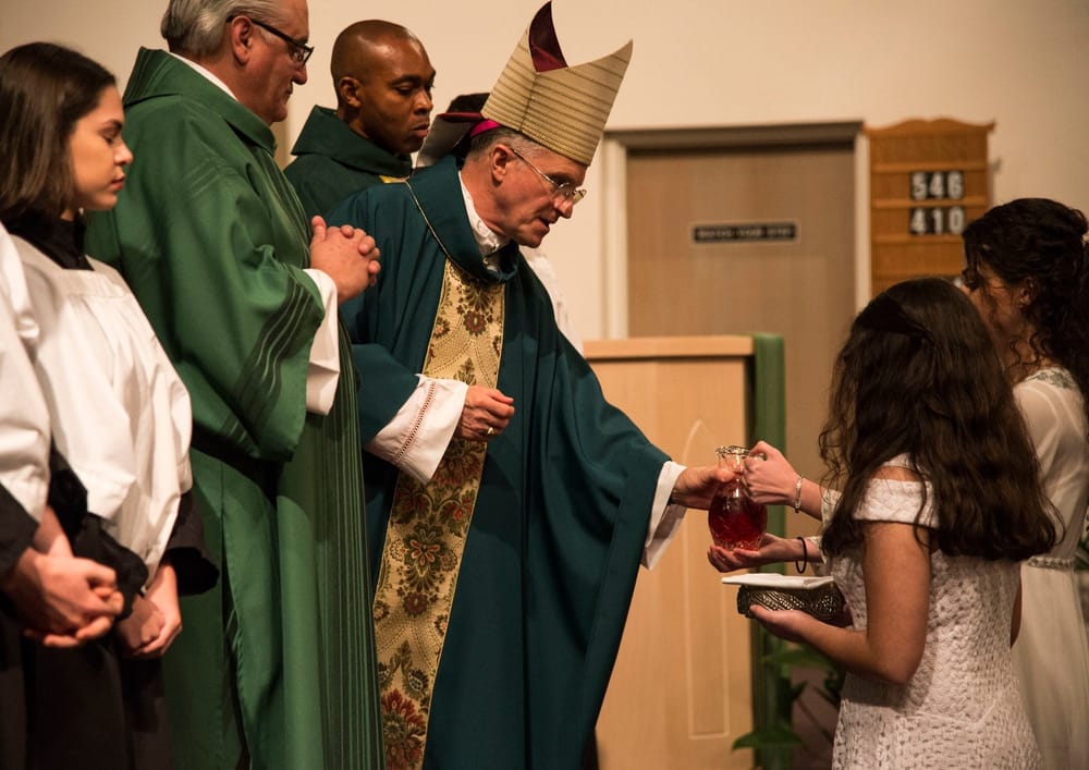 Archbishop Broglio Receives Wine for Communion at MacDill Chapel (2019)