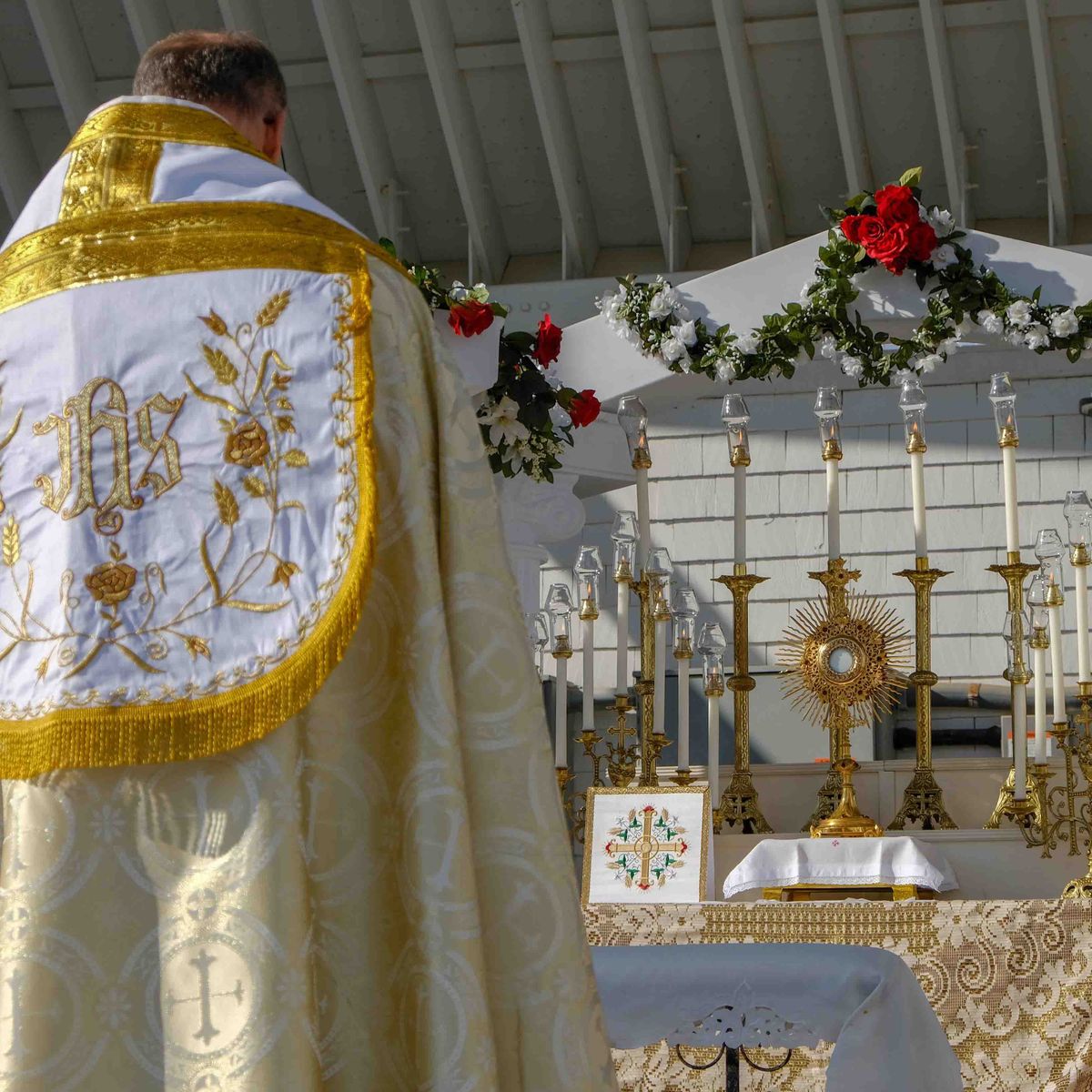 Priest, Altar, and Monstrance - Catholic Stock Photo
