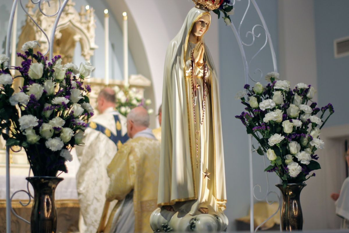 Our Lady of Fatima Statue at Centennial Latin Mass - Catholic Stock Photo