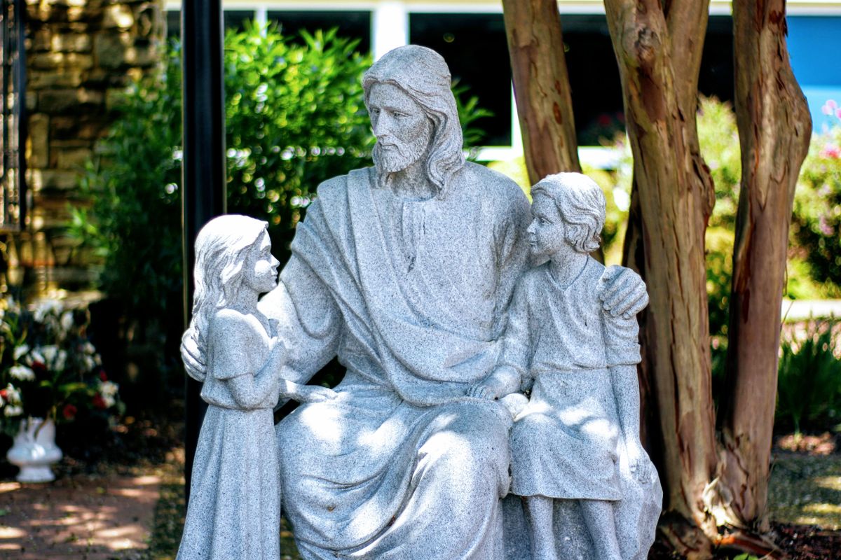 Jesus with Children Statue - Catholic Stock Photo