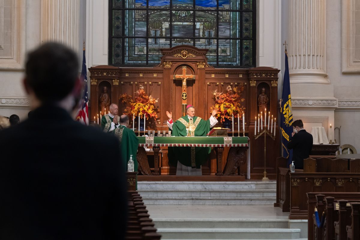 Communion at Naval Academy Catholic Mass - Catholic Stock Photo