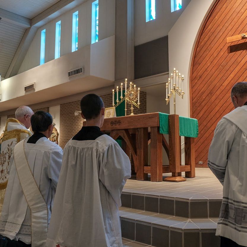 Eucharistic Adoration with Priests and Altar Servers - Catholic Stock Photo