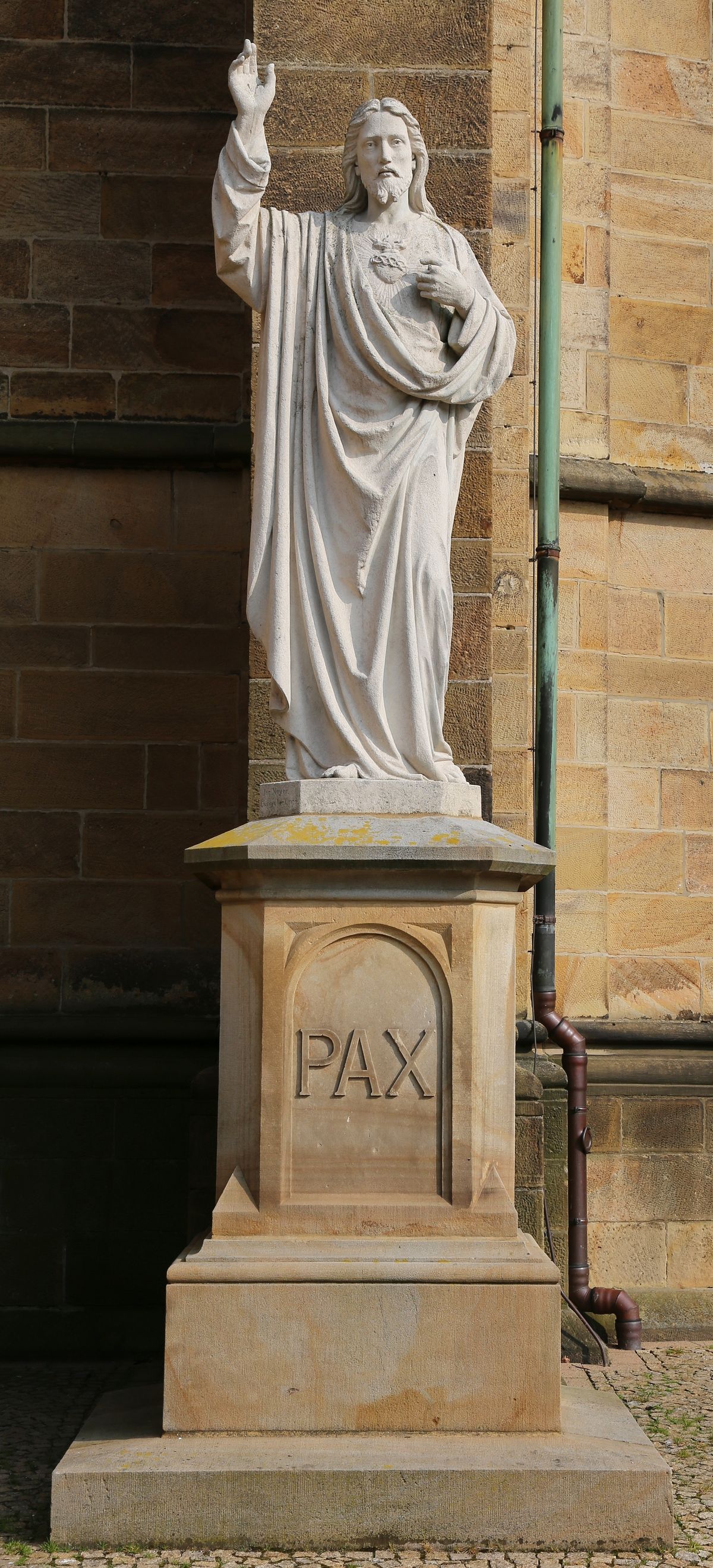 Statue of the Sacred Heart of Jesus Christ at the Church of Saint Agatha (North Rhine-Westphalia, Germany) - Catholic Stock Photo