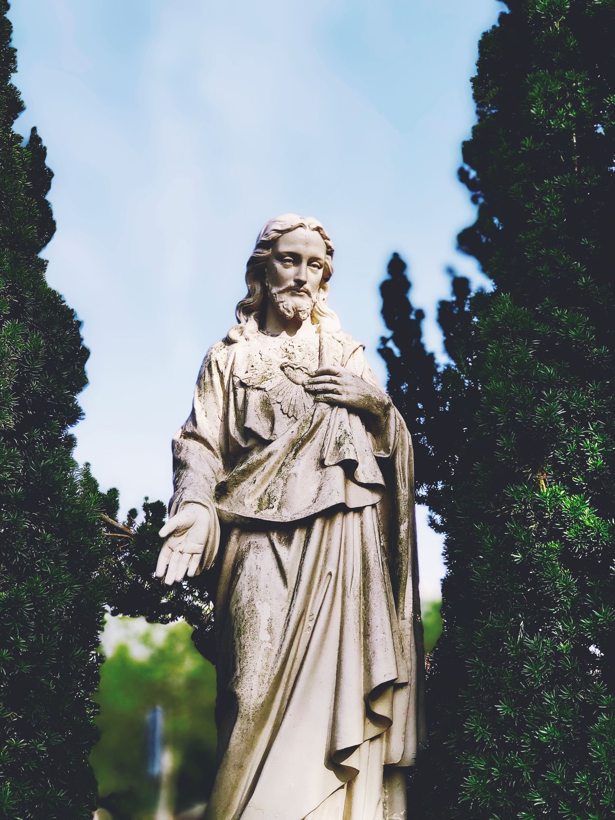 Jesus Statue in a Garden - Catholic Stock Photo