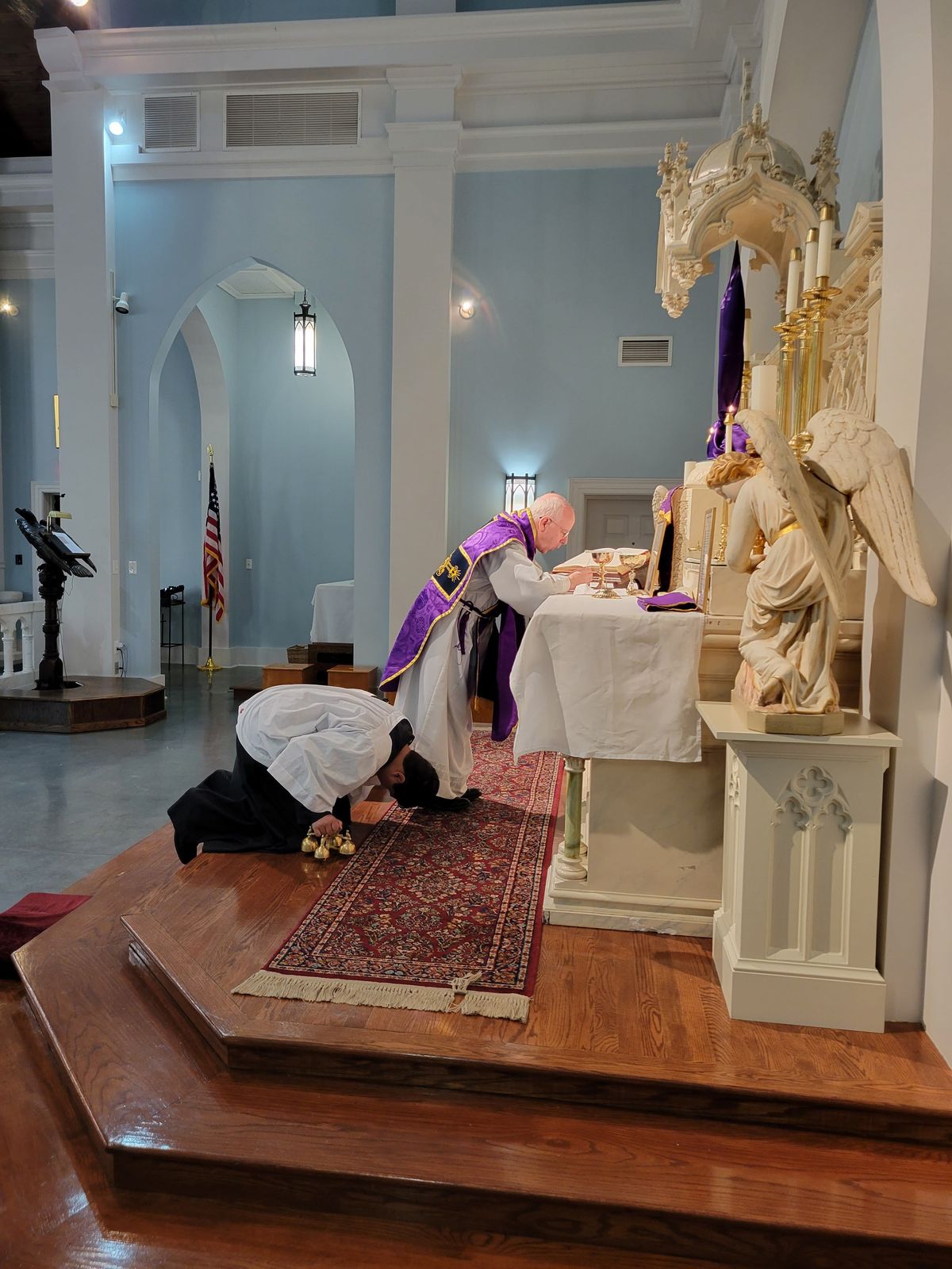 Priest Consecrating the Eucharist on Passion Sunday, FSSP Latin Mass, Chesapeake Virginia (2022) - Catholic Stock Photo