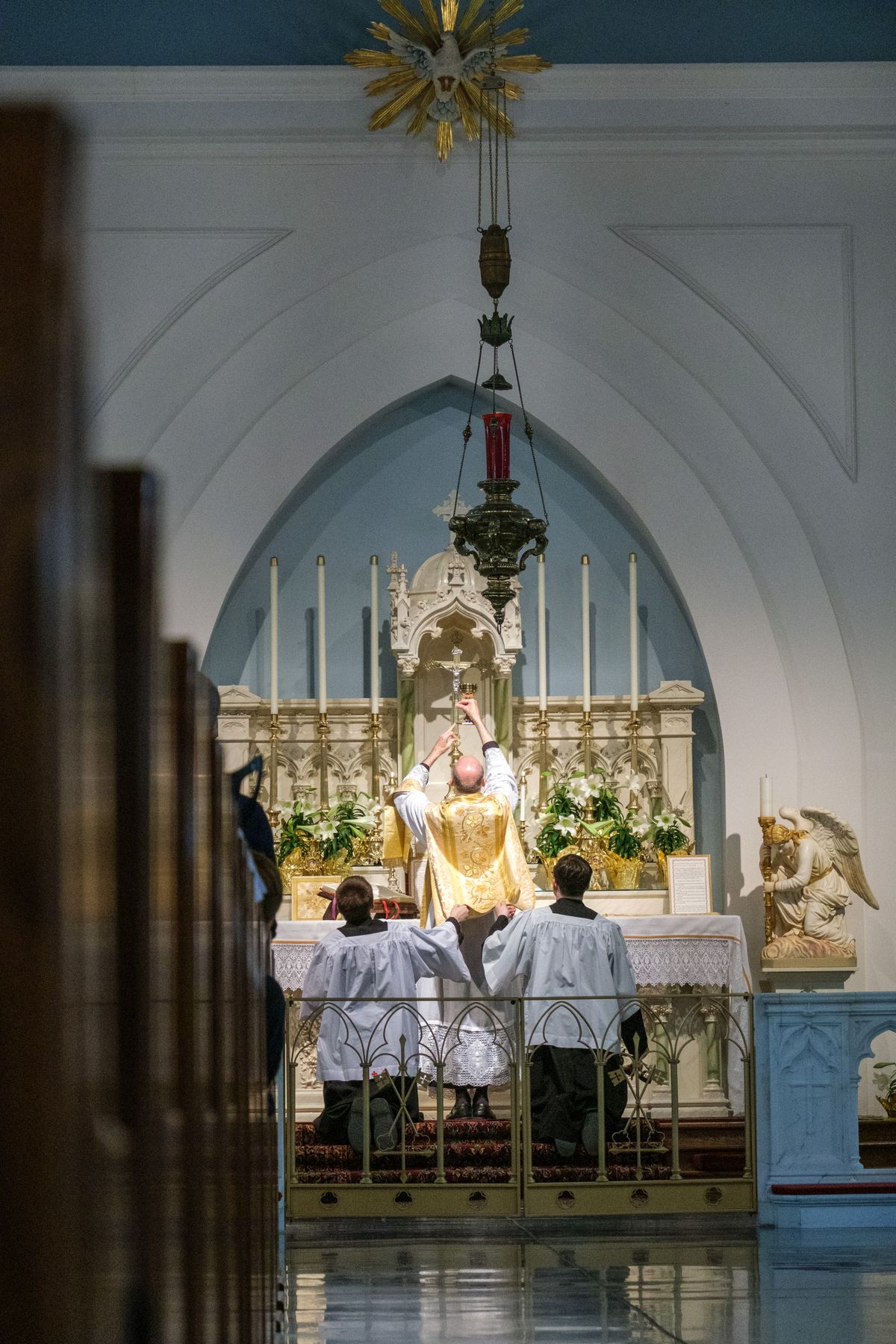 Elevation of the Chalice on Easter Sunday, Latin Mass, 2023 (Saint Benedict's Parish, Chesapeake, Virginia, United States) - Catholic Stock Photo