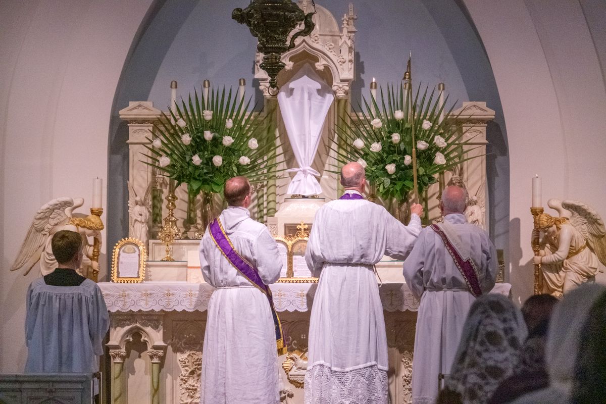 Priests Stripping the Altar on Holy Thursday 2023 (Saint Benedict's Parish, Chesapeake, Virginia, United States) - Catholic Stock Photo