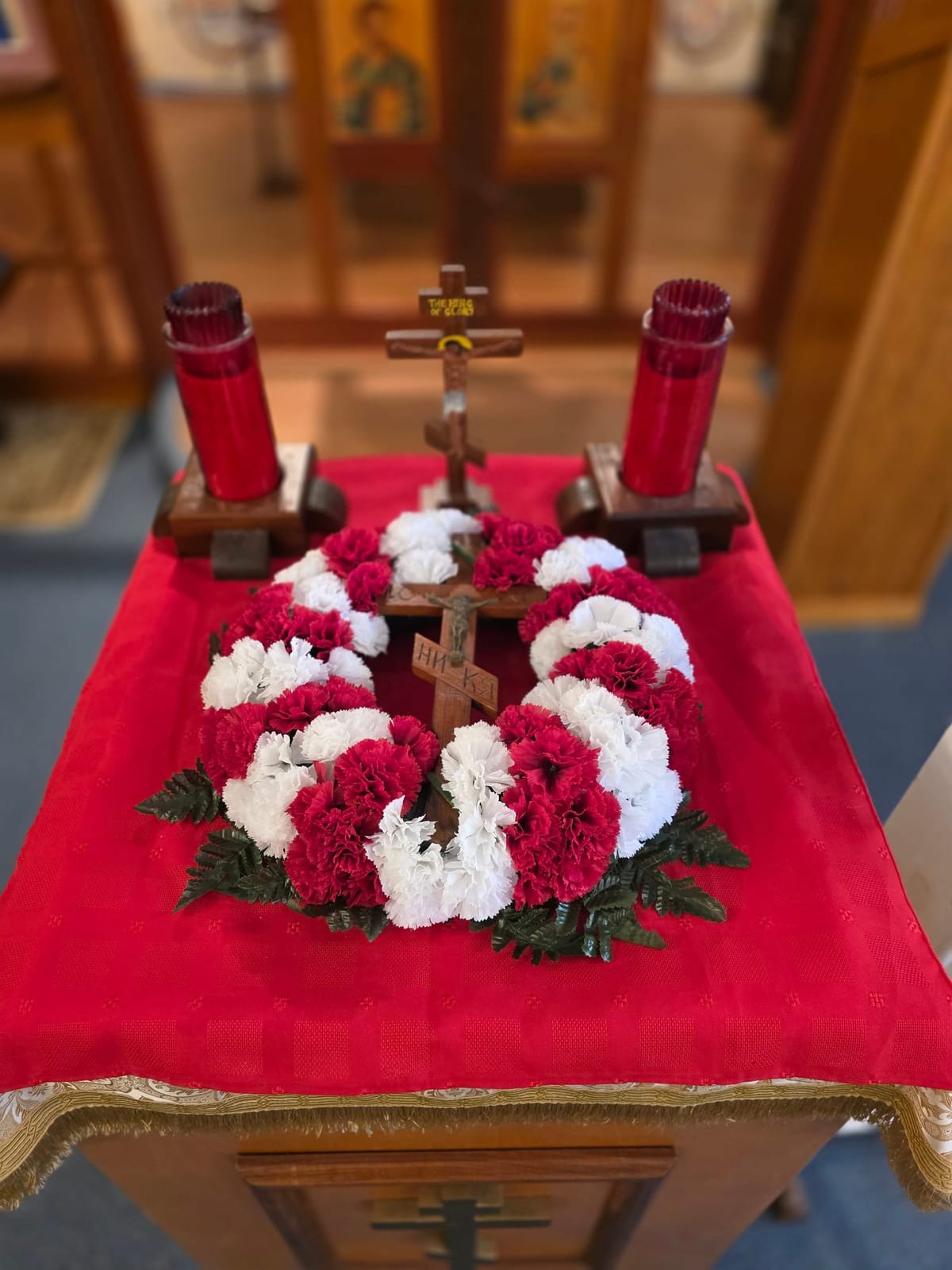 Flower-Covered Cross for the Sunday of the Holy Cross at Our Lady of Perpetual Help Byzantine Catholic Church, Virginia Beach (2026) by Shalone Cason - Public Domain Catholic Stock Photo