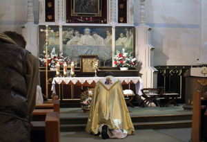 Prayer at Church of Our Lady of Częstochowa, London UK - Catholic Stock Photo
