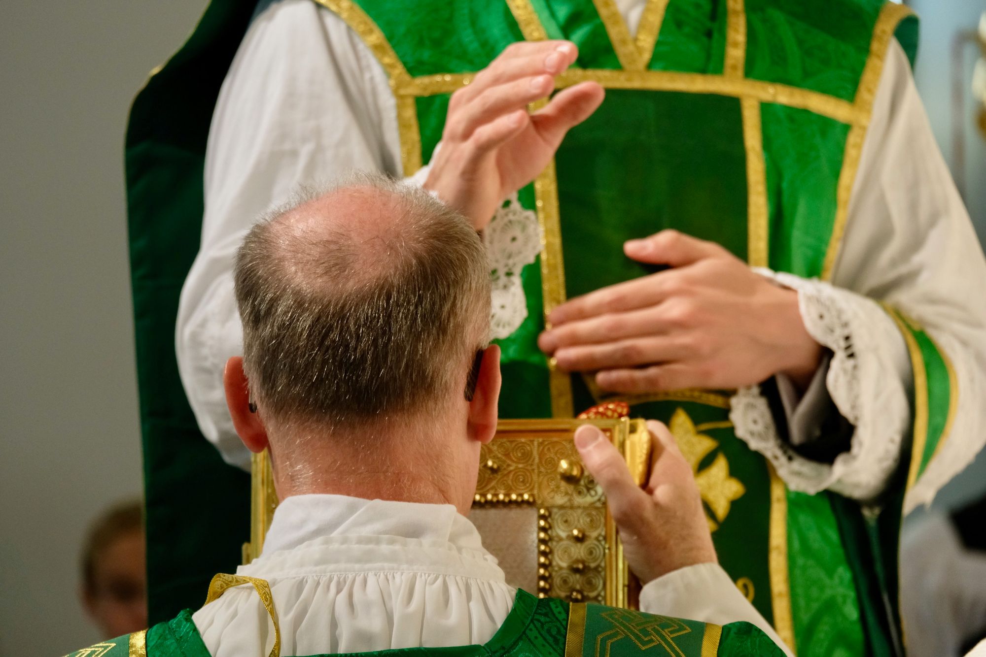 Blessing of Gospel at Solemn Latin Mass - Catholic Stock Photo