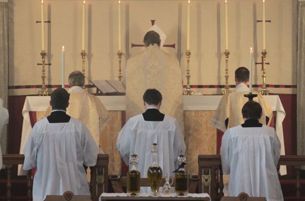 Eucharistic Prayer at Chrism Latin Mass - Catholic Stock Photo